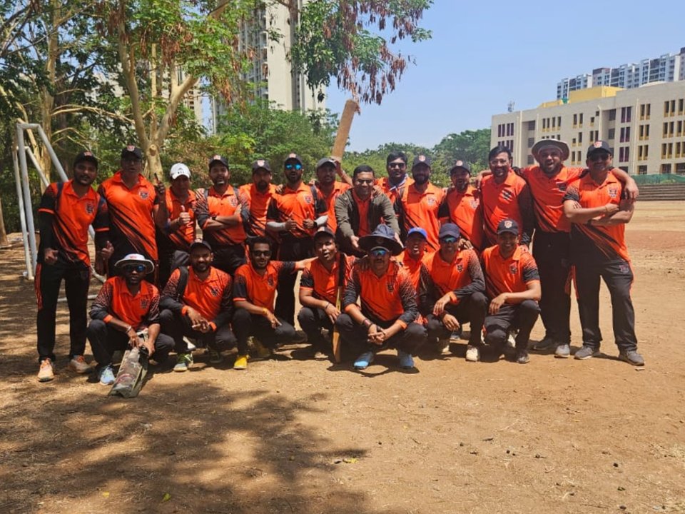 The Sur Warriors squad in the original orange and black kit